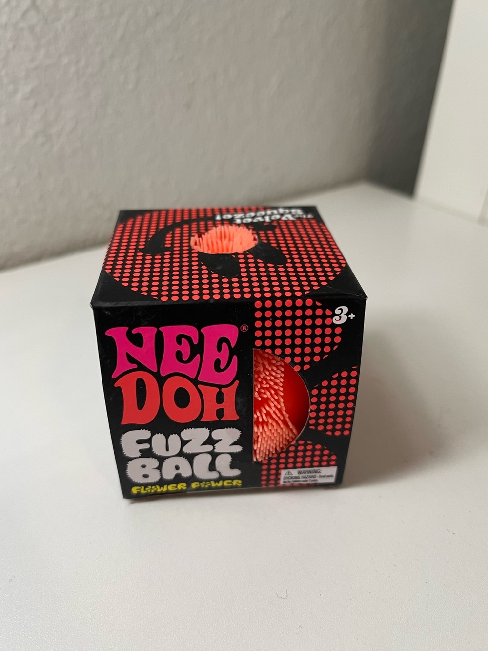 NeeDoh Flower Power Fuzz Ball Orange